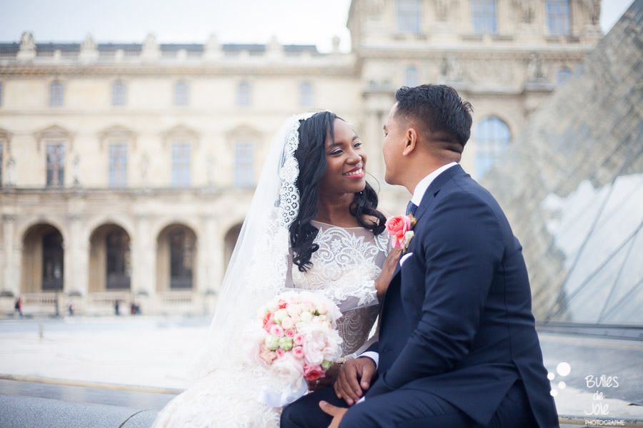 Elopement in Paris at the Louvre - bride and groom looking at each other with love. More photos: