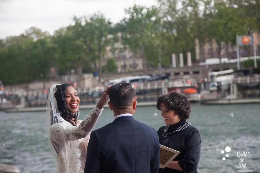 Elopement in paris - Woman smiling at her men while touching his hair. More photos: