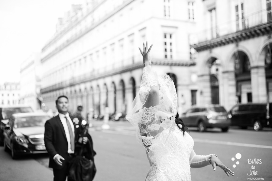Bride and groom having fun. Bouquet launch at the end of a parisian elopement. More photos: