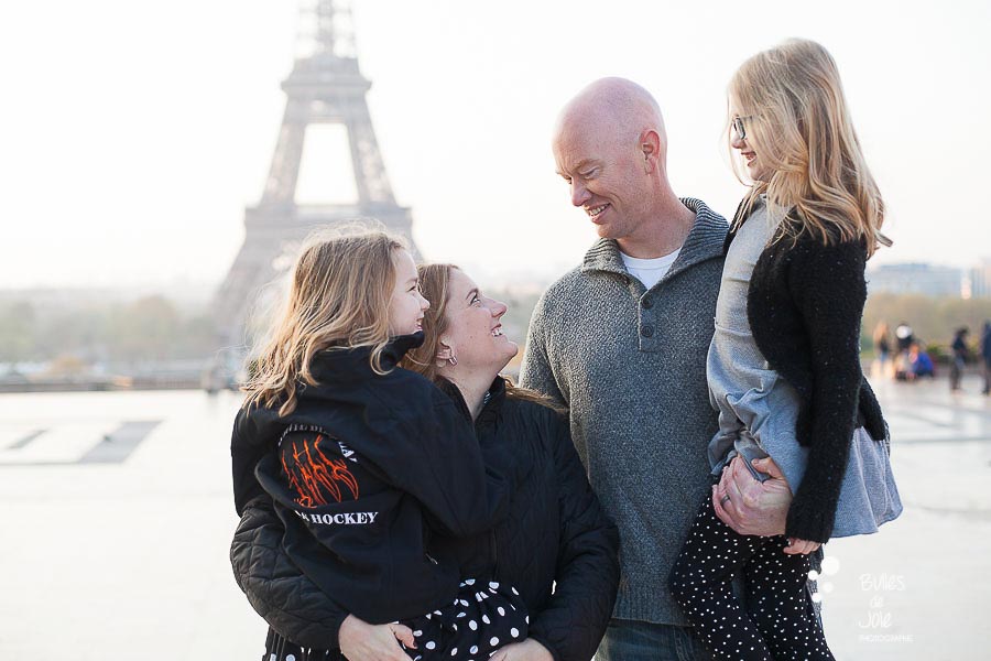 Family of 4 having a photoshoot at the Eiffel Tower, Paris - France