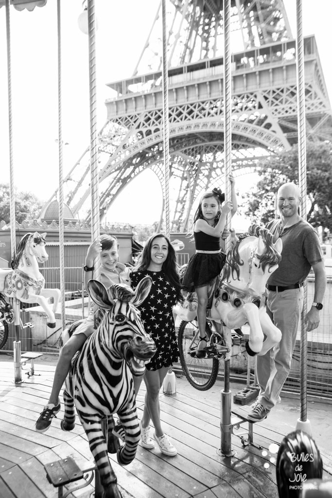 Family photos on a carroussel in Paris
