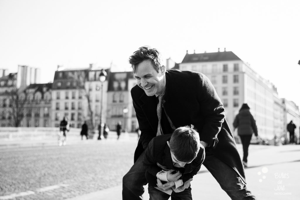 Paris family photoshoot - a dad and his son having fun together