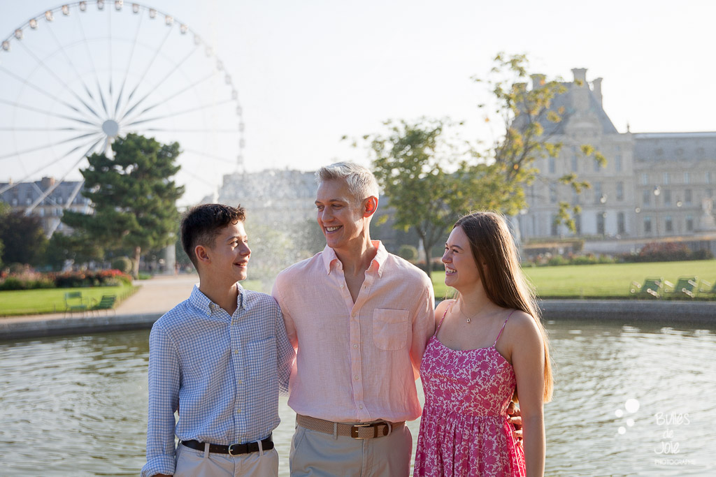 Dad and their children during a Paris photoshoot at the Tuileries Gardens